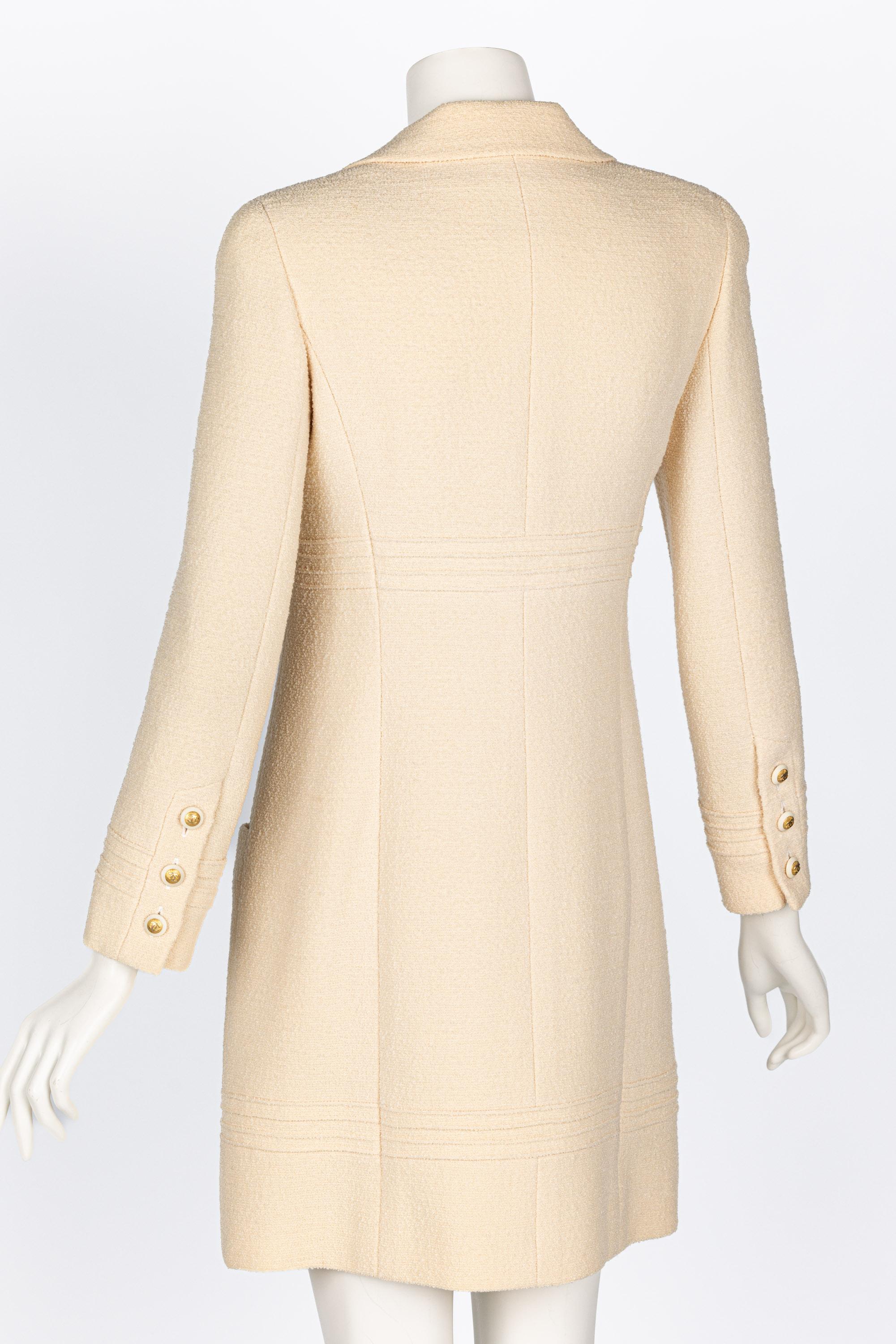 CHANEL Chaqueta de lana bouclé color crema con los icónicos botones CC Sunburst - c. 1999 Blanco en venta
