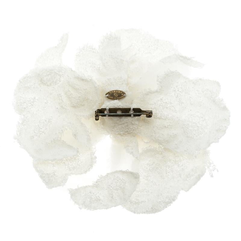 Add a hint of elegance to your evening look with this brooch from the house of Coco Chanel. Exquisitely designed into a flower that imparts a look of lush freshness, this brooch can be paired with your ensembles to add a hint of élan.

Includes: