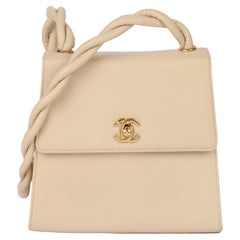 Borsa a tracolla Chanel in pelle di caviale crema intrecciata Vintage By