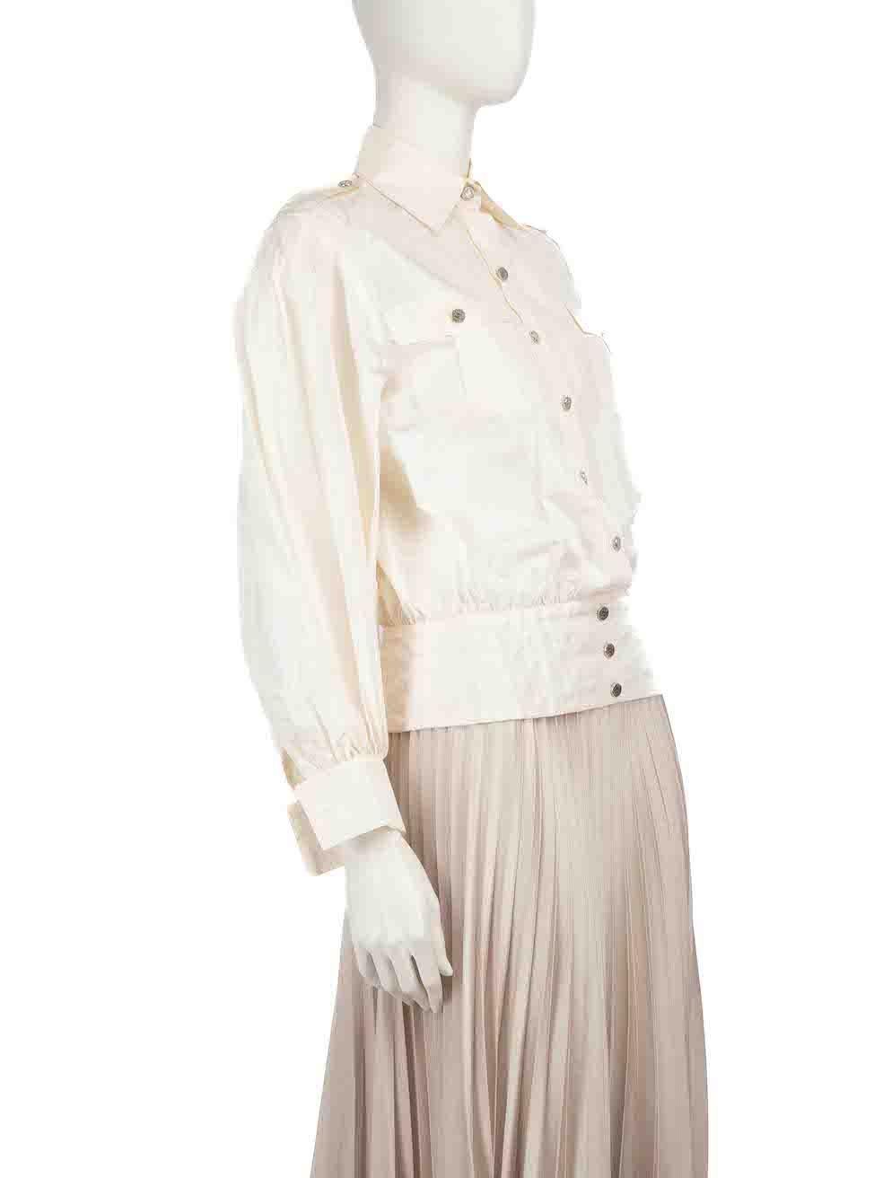 CONDITION is Very good. Hardly any visible wear to the Jacket is evident on this used Chanel designer resale item.
 
 
 
 Details
 
 
 Cream
 
 Silk
 
 Jacket
 
 Long sleeves
 
 Button up fastening
 
 CC Logo buttons
 
 Sheer
 
 2x Front pockets
 
