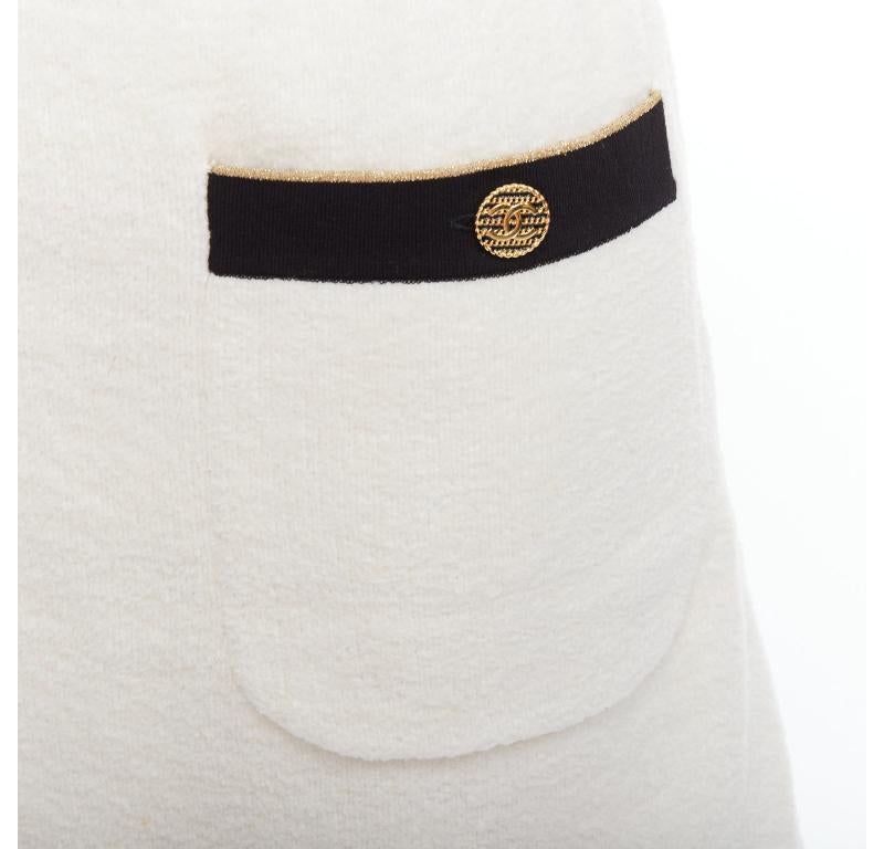 CHANEL cream cotton tweed nautical CC gold button A-line skirt FR34 XS
Reference: YIKK/A00182
Brand: Chanel
Designer: Virginie Viard
Material: Cotton, Blend
Color: Cream, Black
Pattern: Solid
Closure: Zip
Extra Details: Side zip. CC logo gold