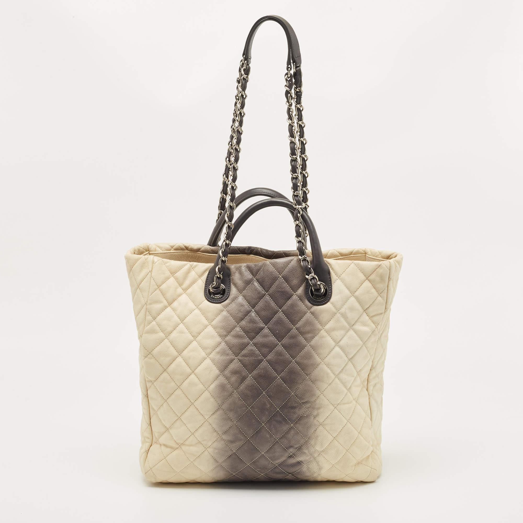 Elevate your style with this Chanel women's tote. Merging form and function, this exquisite accessory epitomizes sophistication, ensuring you stand out with elegance and practicality by your side.

