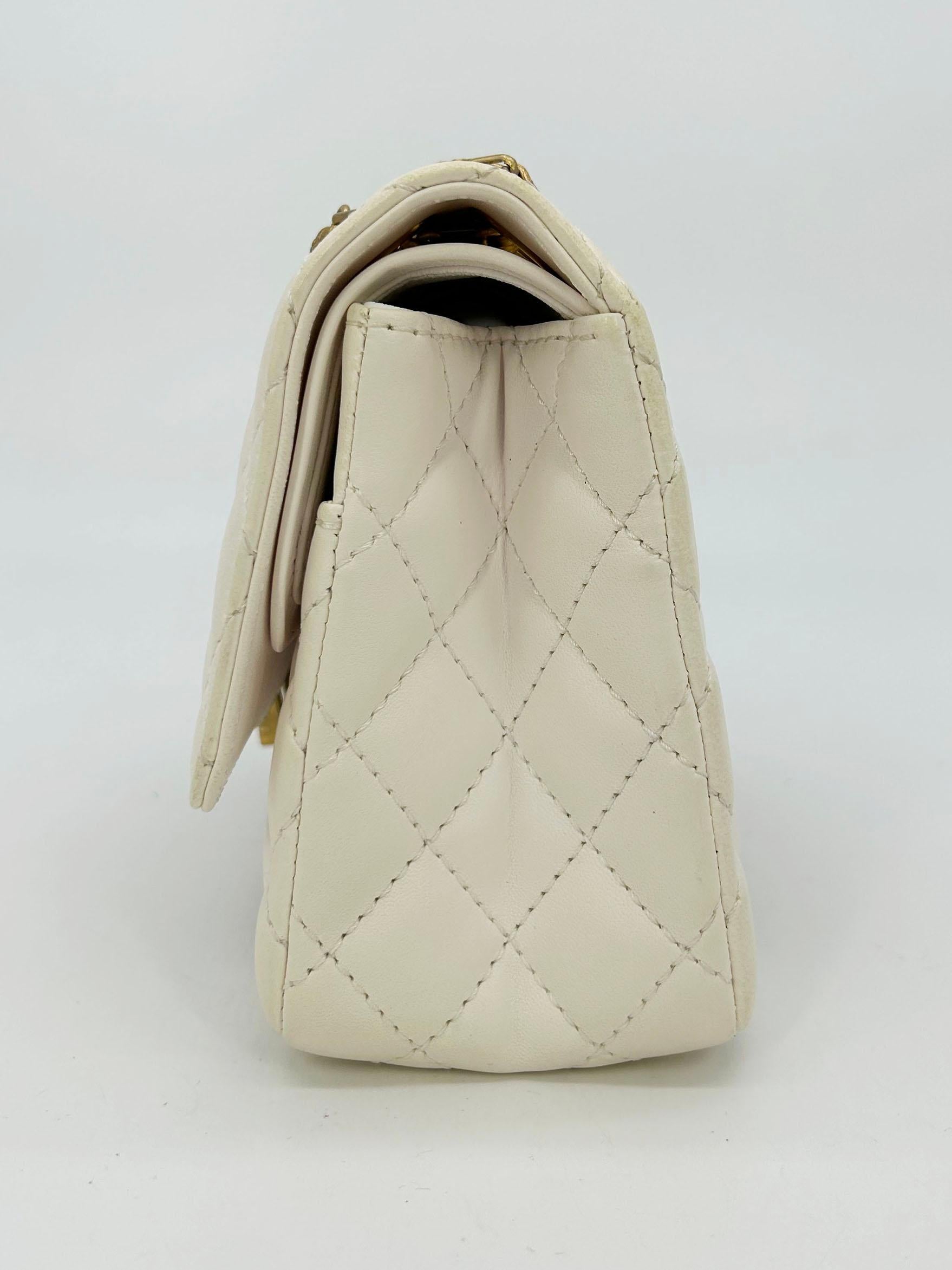 Chanel Cream Leather Gold Alligator Double Flap Classic Reissue 2.55 in New- Unused- with tags from store condition. Cream quilted leather with gold alligator center along front and back side. Matte gold hardware. Signature double flap classic