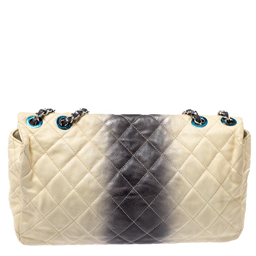 Chanel's Flap bags are the most iconic handbags. The caviar leather construction features a well-known quilted pattern. It has a chain-leather woven strap along with a CC twist lock flap closure in silver-tone. The single flap opens to a