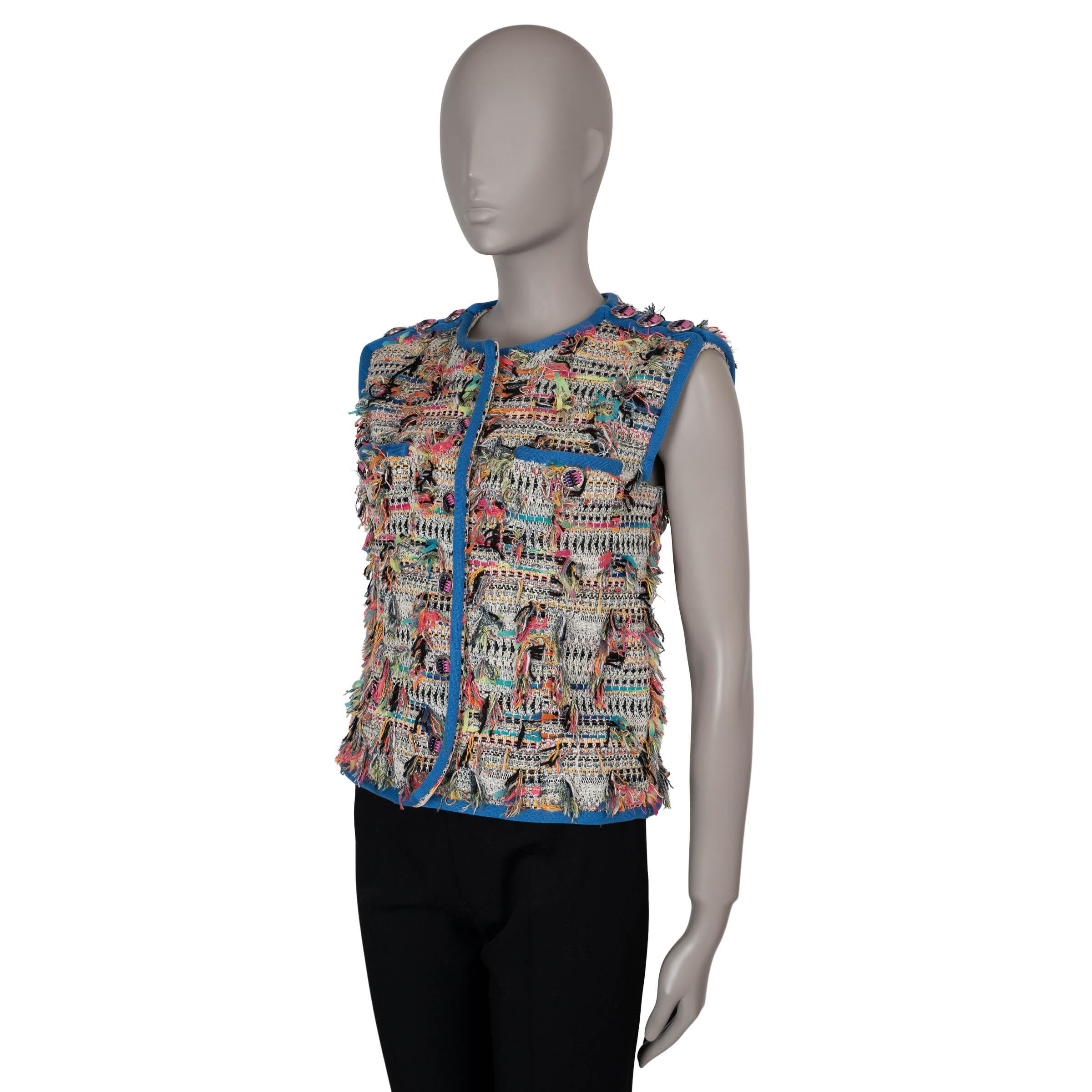 This 100% authentic Chanel vest in cream, black, and multicolor tweed combines a vibrant mix of cotton (59%), acrylic (26%), polyurethane (10%), nylon (4%), and other fibers (1%) with playful multicolor fringe throughout. Designed with a boxy