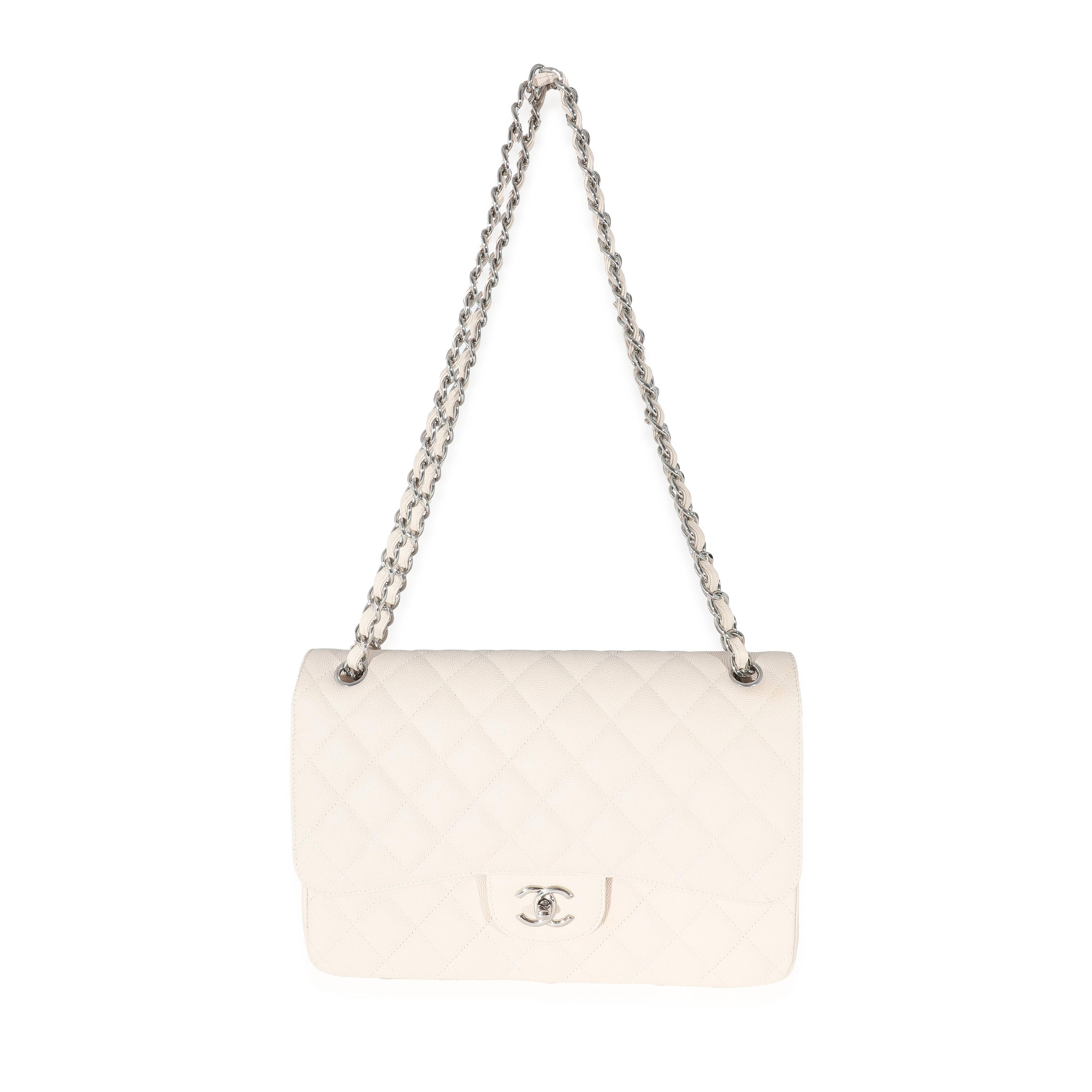 Listing Title: Chanel Cream Quilted Caviar Jumbo Classic Double Flap Bag
SKU: 133418
Condition: Pre-owned 
Condition Description: A timeless classic that never goes out of style, the flap bag from Chanel dates back to 1955 and has seen a number of