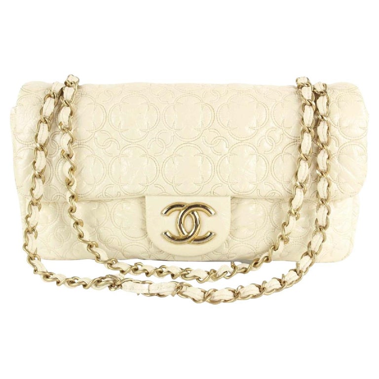 Chanel Cream Quilted Flower Embossed Medium Gold Chain Flap Bag 862116 at  1stDibs