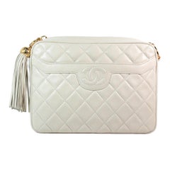 Chanel - Sac à bandoulière en cuir matelassé crème