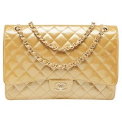 Used Chanel Cream Quilted Patent Leather Maxi Classic Single Flap Bag
