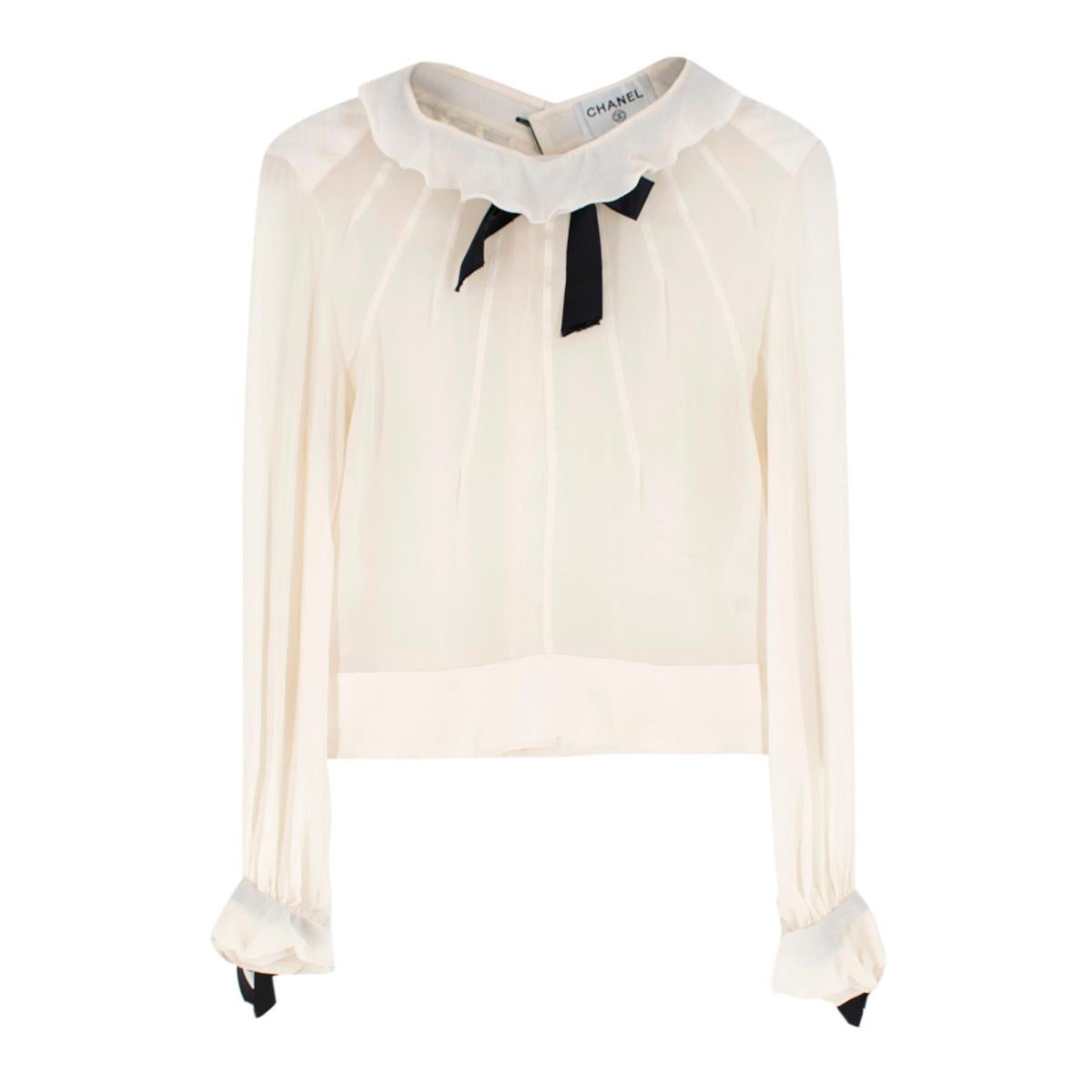 cream sleeveless chiffon blouse