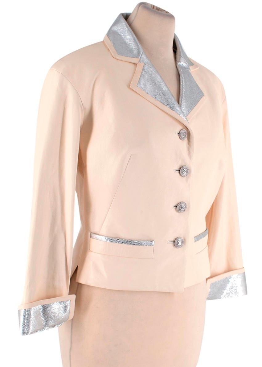 Chanel Cream & Silver Lizard Embossed Leather Blazer
 

 - Nude-cream hue, butter-soft smooth leather blazer, with metallic silver lizard-embossed accents to the collar and cuff
 - Signature CC embossed front button fastening
 - 2 inset hip pockets