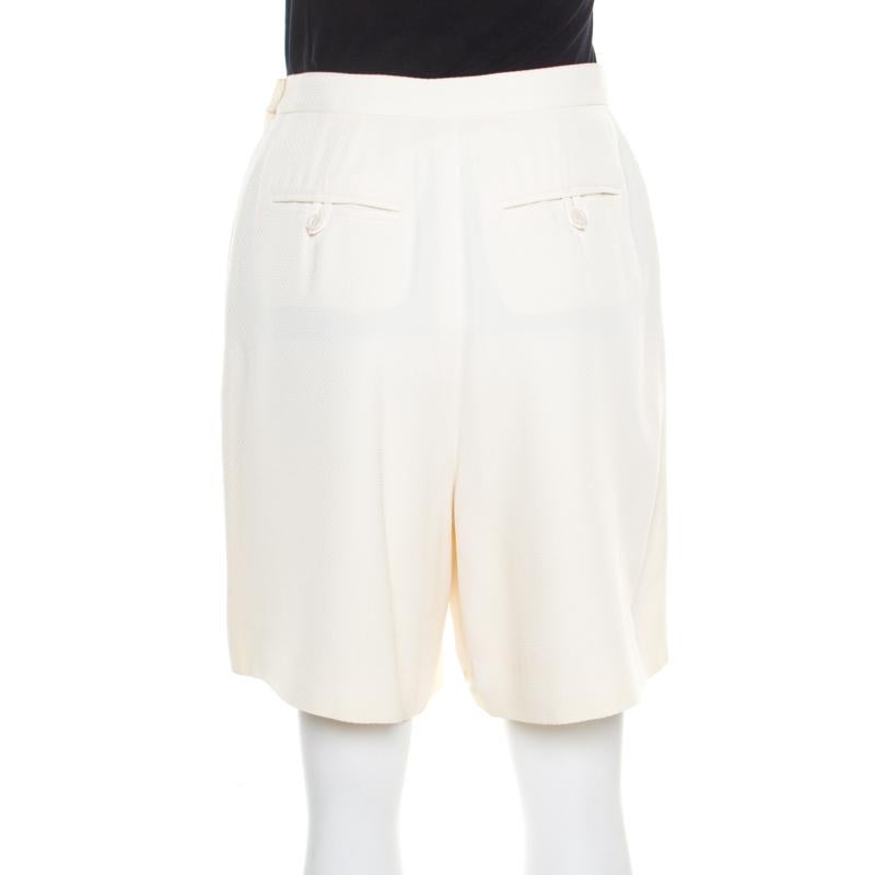 These Chanel high-waisted shorts offer great comfort and style. They are crafted from a blend of fabrics and feature a muted cream hue. These come equipped with three external pockets.

Includes: The Luxury Closet Packaging

