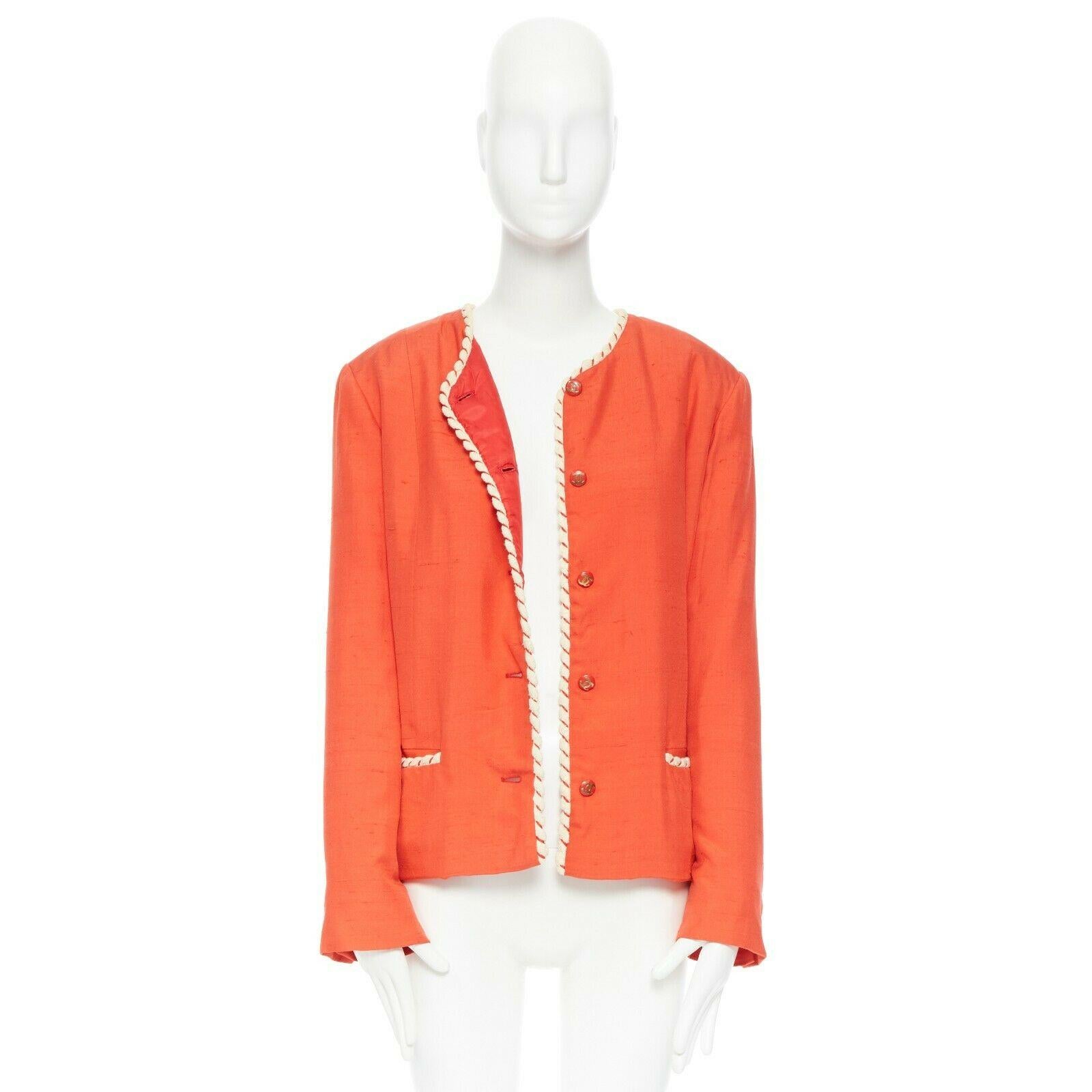 CHANEL CREATIONS  Vintage 1970's red orange quilted lining  trim jacket US16 XL
Brand: CHANEL
Model Name / Style: Quilted jacket
Material: Other; composition lael removed. Feels like linen.
Color: Red; vermillon red
Pattern: Solid
Closure: