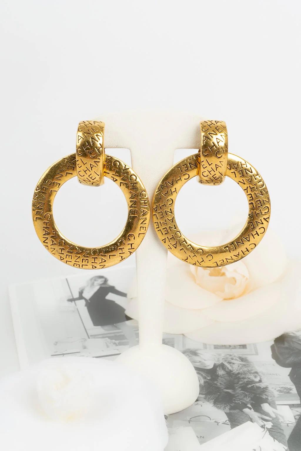 Artist Chanel Creole Engraved Gold Metal Clip Earrings For Sale