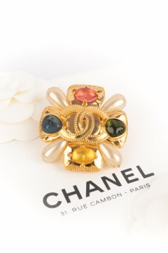Chanel cross brooch