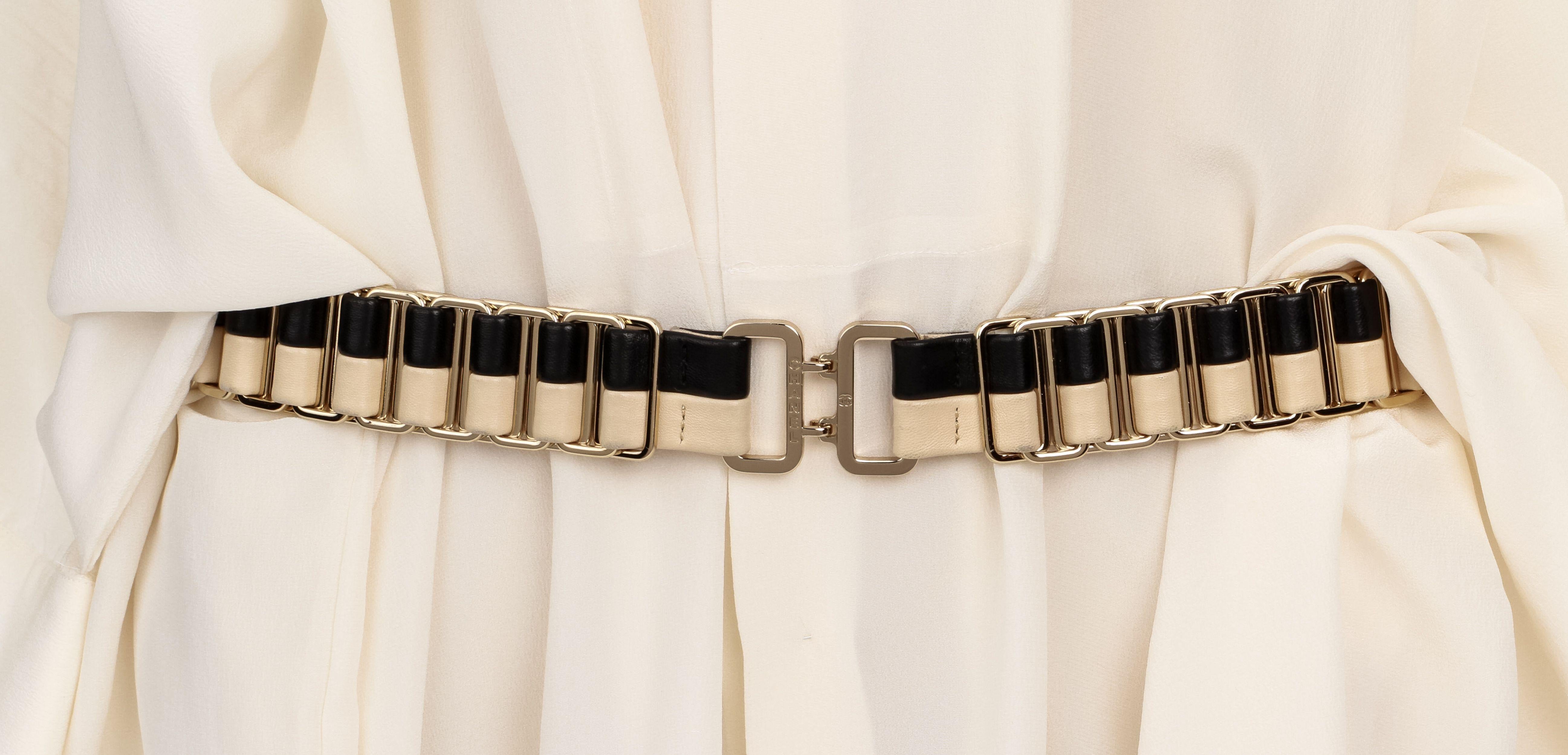 Cruise 2005 black and beige belt with light gold hardware. 85cm/34”. Large size. Comes with original dust cover.