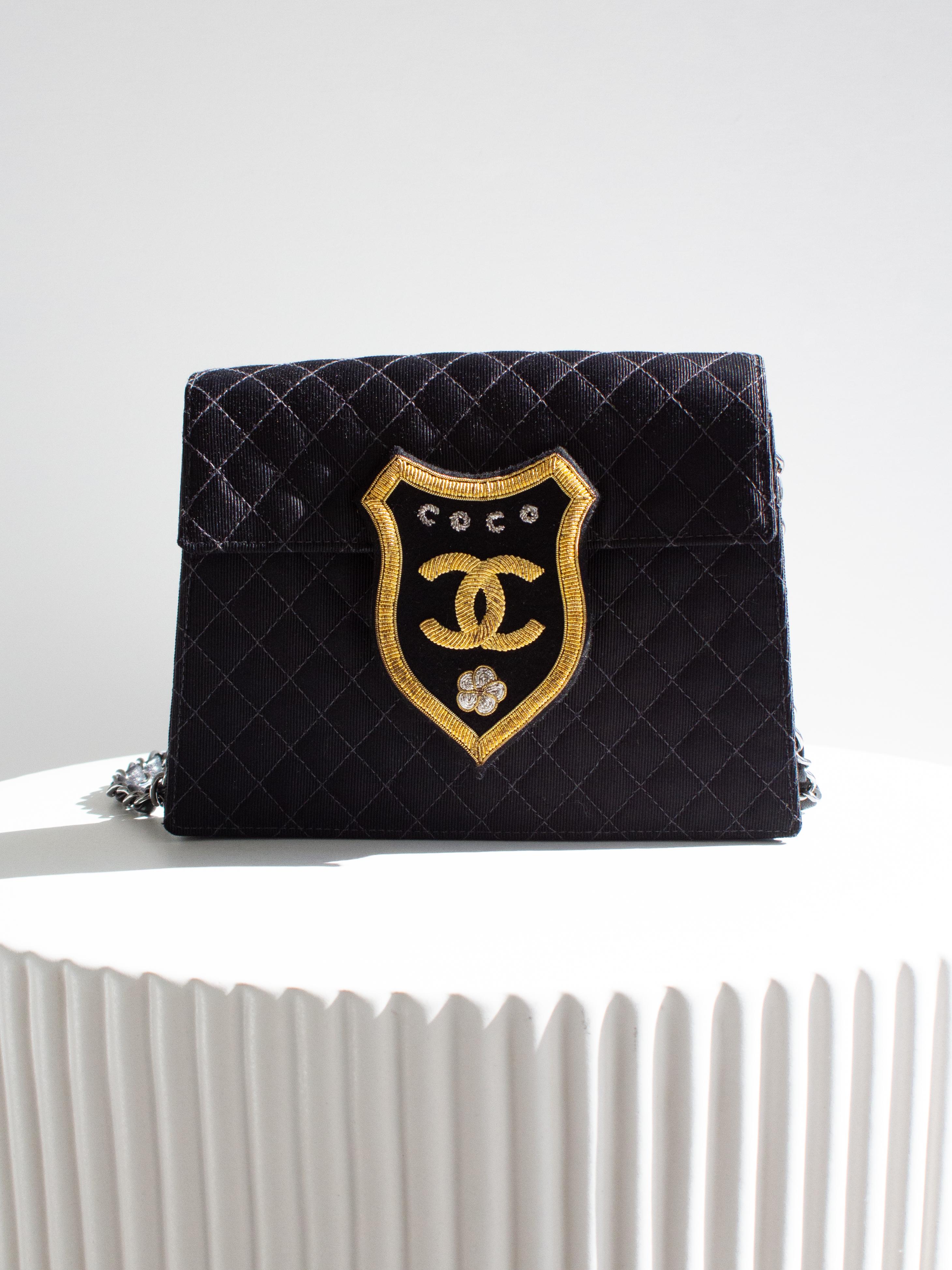 Chanel Cruise 2005 Trapeze Quilted Black Coco CC Camellia Crest 05C Mini Bag In Good Condition For Sale In Jersey City, NJ