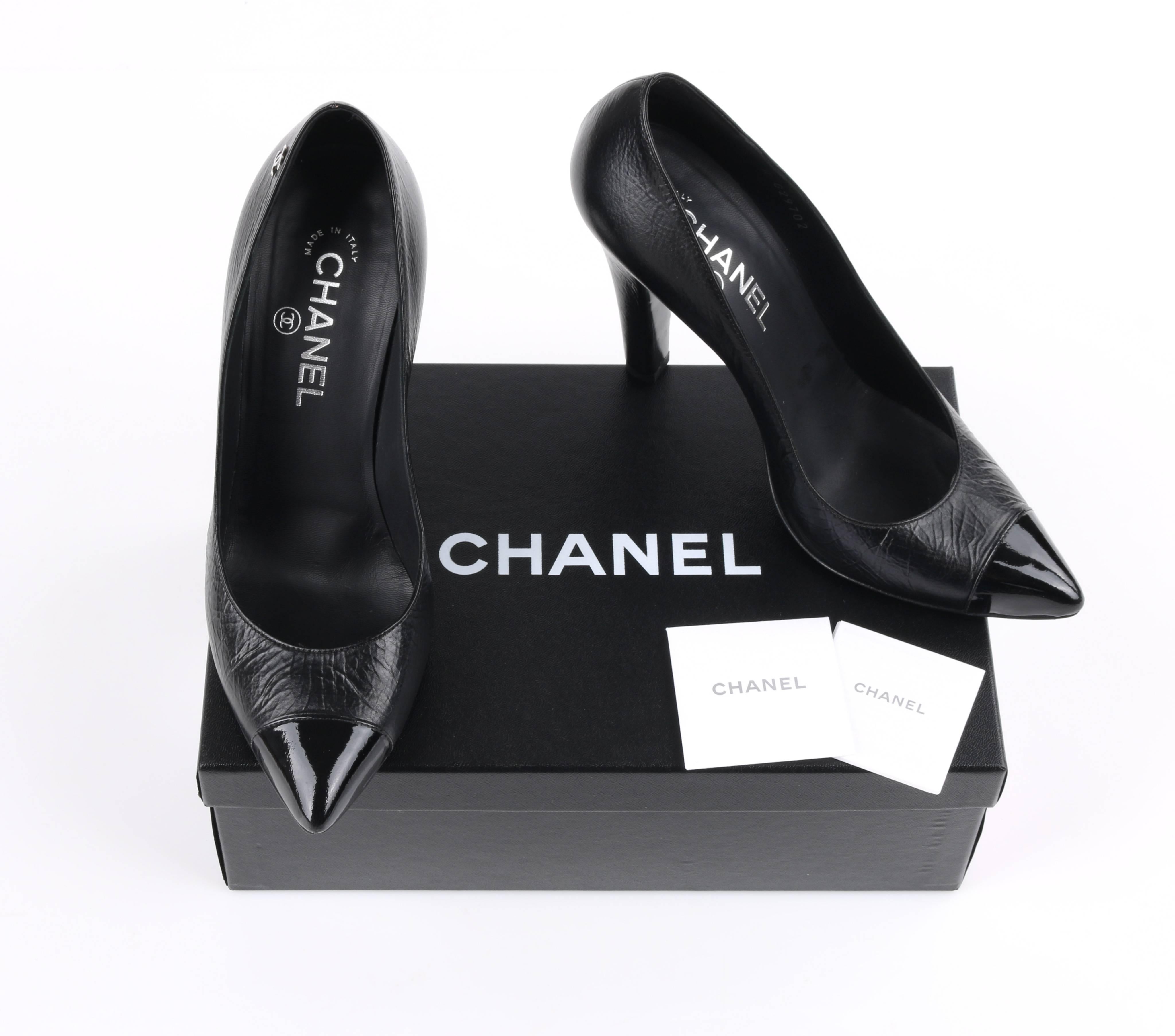 Chanel Cruise 2014 black textured (crinkle) leather pointed cap toe pumps. Designed by Karl Lagerfeld. Black texturized leather upper. Silver-toned metal 