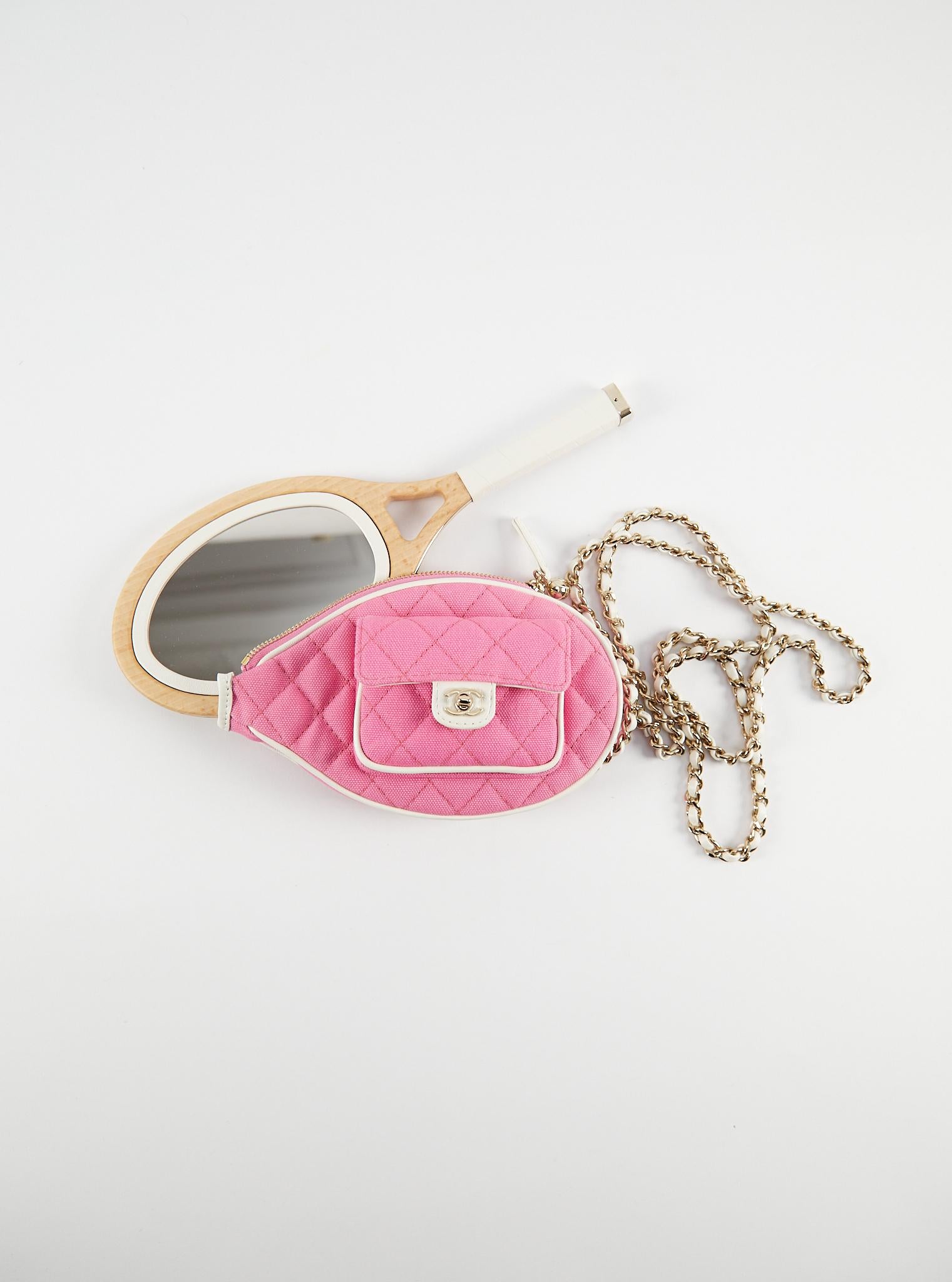 Chanel Cruise 2023 Mini-Raquet Mirror Clutch in Pink 

Quilted Cotton, Mirror in wood with Gold-tone Hardware 

Accompanied by: Chanel Box, Dustbag & Authenticity Chip