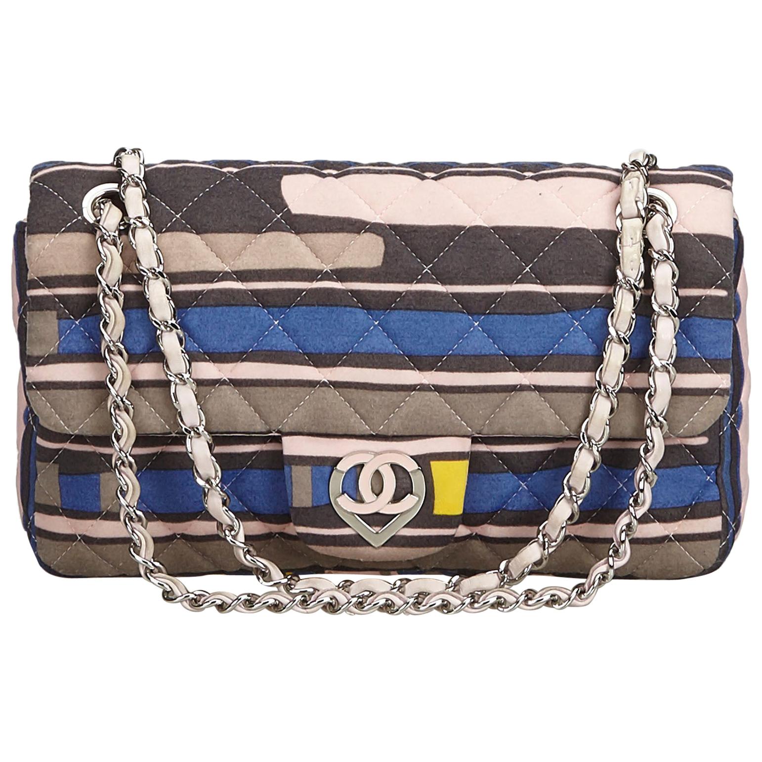 Chanel Cruise heart-shaped CC clasp fabric flap bag 
