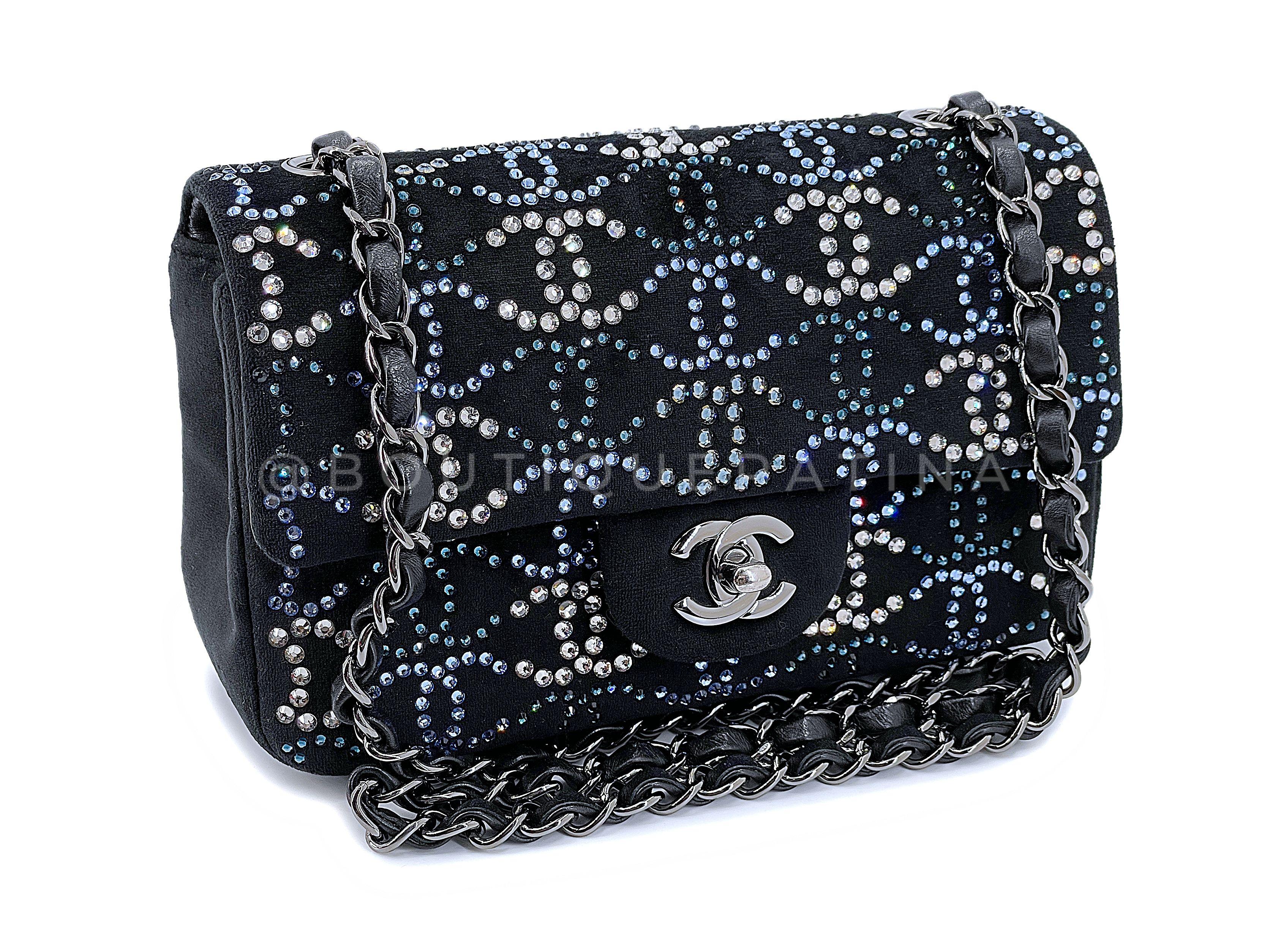 Store item: 67652
An absolute stunner of a bag is this Chanel Crystal CC Embellished Rectangular Mini Flap Bag Dark Navy Velvet RHW. Photos do not do it justice; please reference detailed videos in our #minidrop highlights on Instagram (link at top