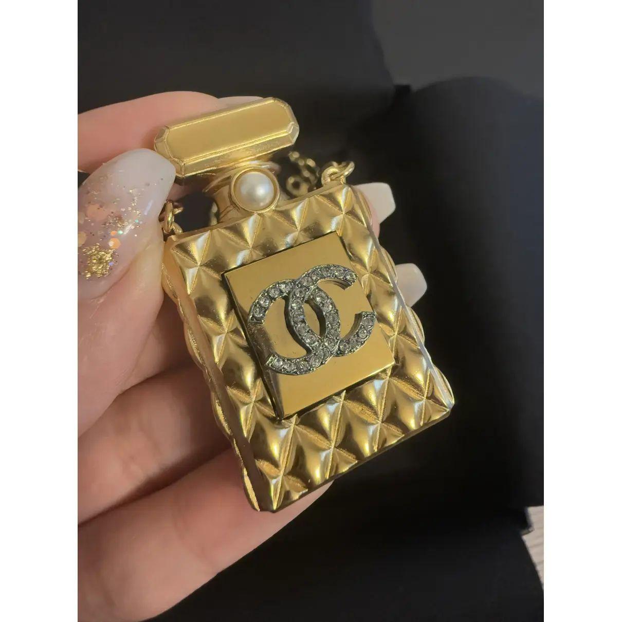 da uomo o donna Collana Chanel con cristalli CC e profumo d'oro e catena in pelle nera in vendita