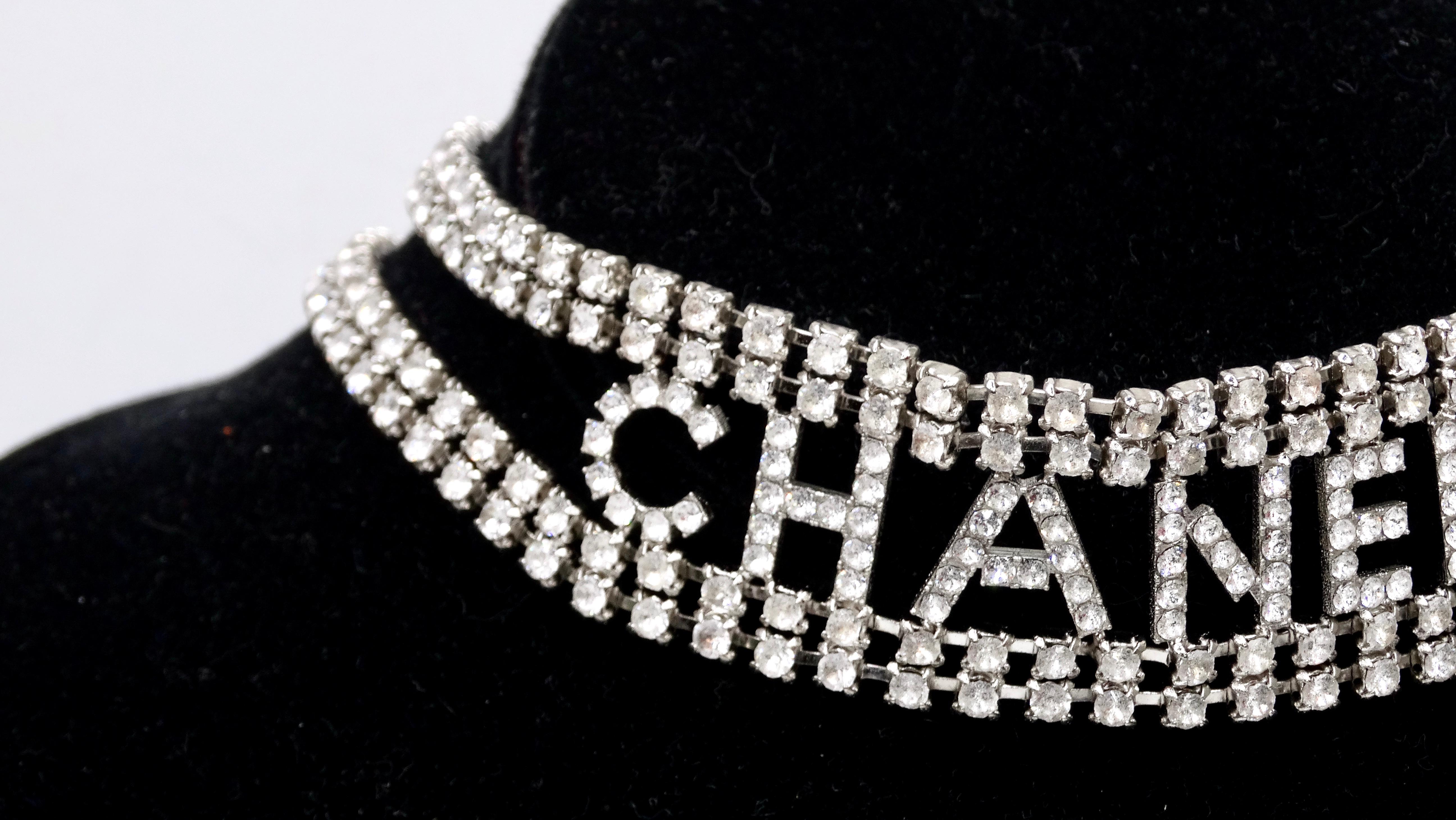 Get your piece of ultra-rare Chanel here! This necklace is from a 2018 collection making this gem a contemporary piece with little to no wear. A no-brainer!! This is an authentic CHANEL Crystal CC Logo Choker Necklace is featured in silver and gives
