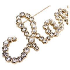 Chanel Crystal & Costume Pearl Gold-Tone "Chanel" Script Brooch 2019