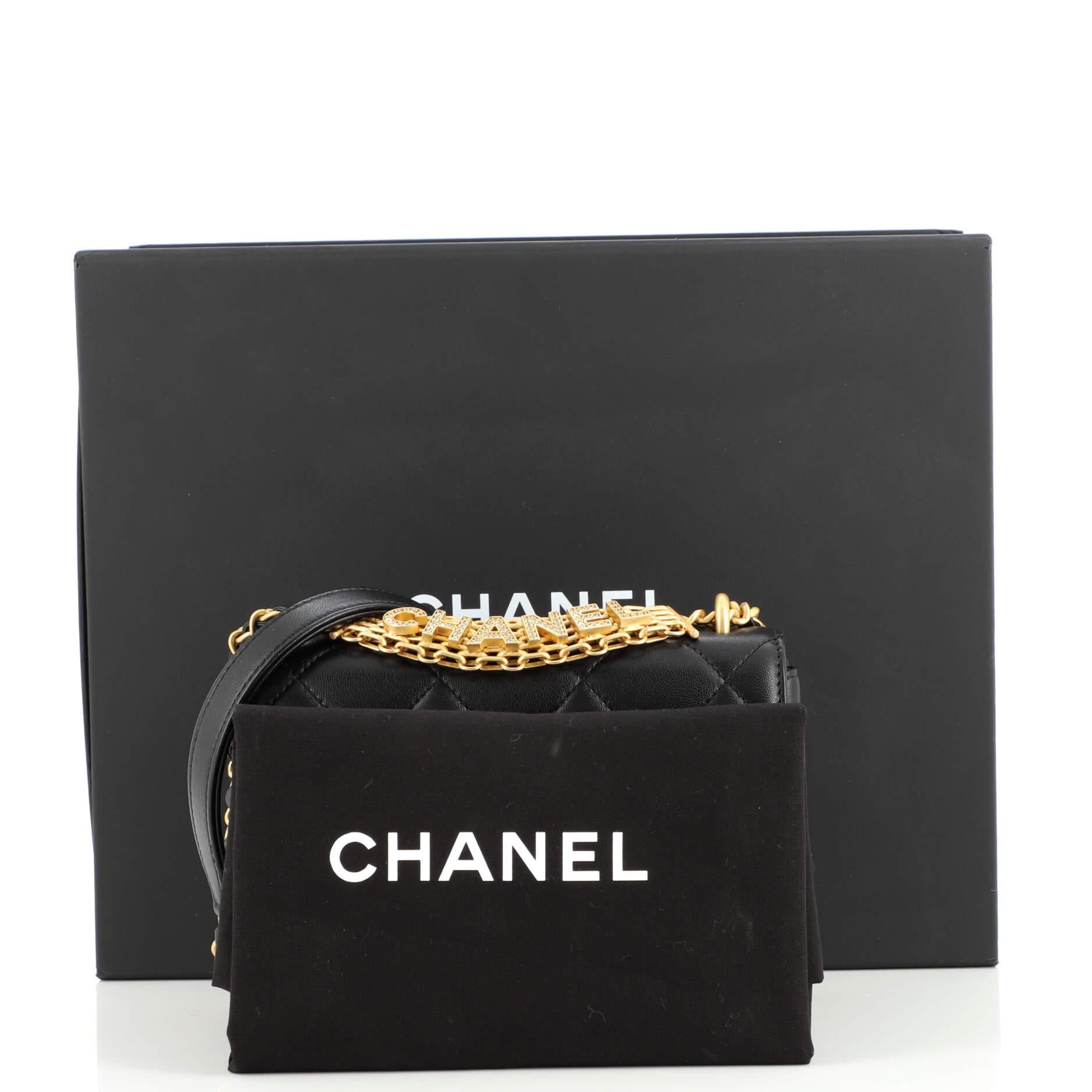Condition: Great. Minor scuffs and creasing on exterior and underneath flap, light wear in interior, scratches on hardware.
Accessories: Dust Bag, Box
Measurements:
Designer: Chanel
Model: Crystal Logo Letters Chain Handle Flap Bag Quilted Lambskin