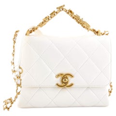 Chanel Crystal Logo Letters Chain Handle Flap Bag Quilted Lambskin Mini at  1stDibs  chanel crystal logo handle mini, chanel crystal logo bag, chanel  bag with gold letters
