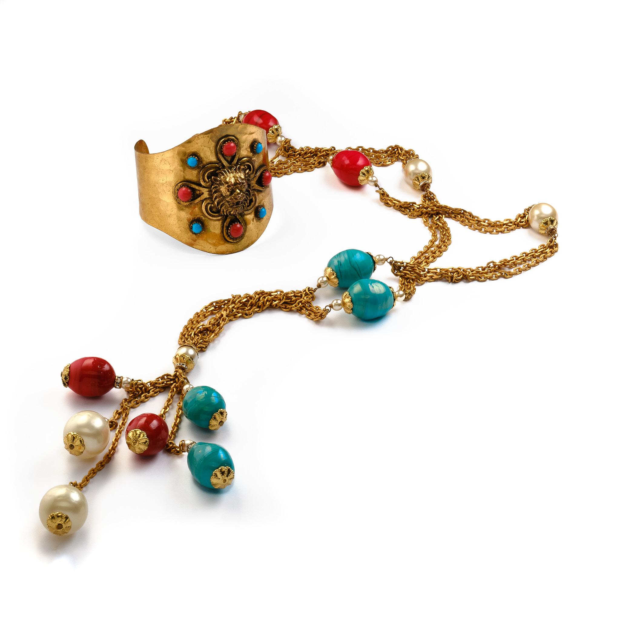Modern CHANEL cuff/bracelet hammered gold plated metal iconic lions , early 1965's For Sale
