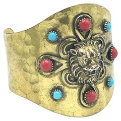 CHANEL cuff/bracelet hammered gold plated metal iconic lions , early 1965's