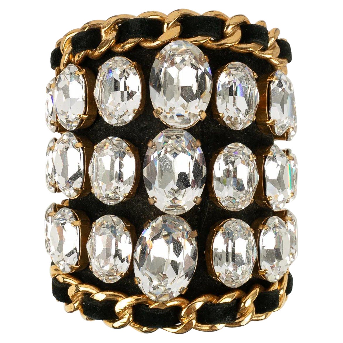 Chanel Manschettenarmband aus schwarzem Leder und goldenem Metall mit Strasssteinen