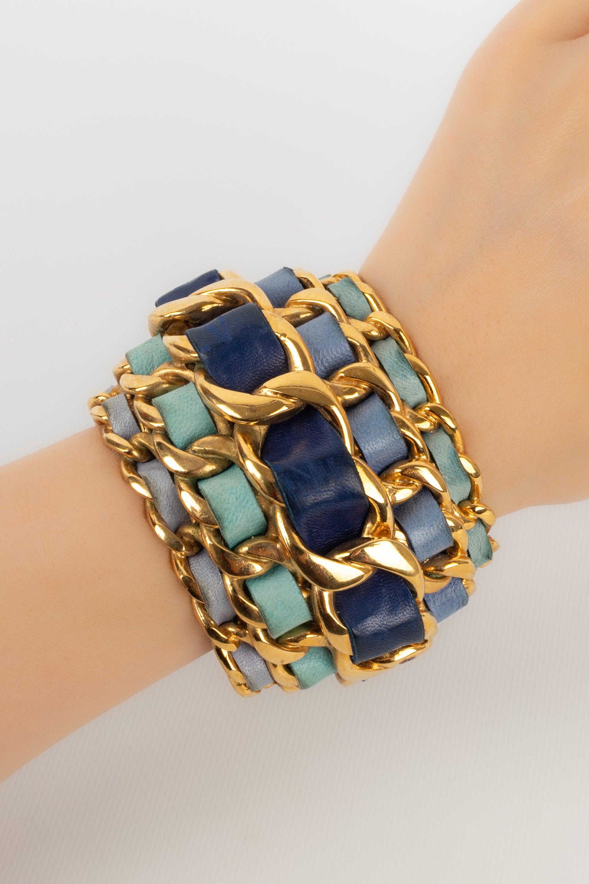 Chanel Cuff Bracelet in Golden Metal Interlaced with Blue Tone Leather, 1991 For Sale 6