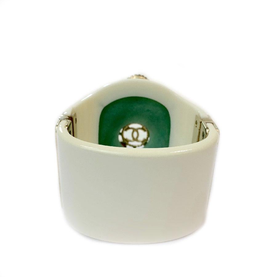 CHANEL Cuff Bracelet in White Resin, Gilt Metal, Pearls and Green Glass 1