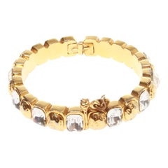 Retro Chanel cuff/ bracelet with gold and glass stones, with spring loaded clasp