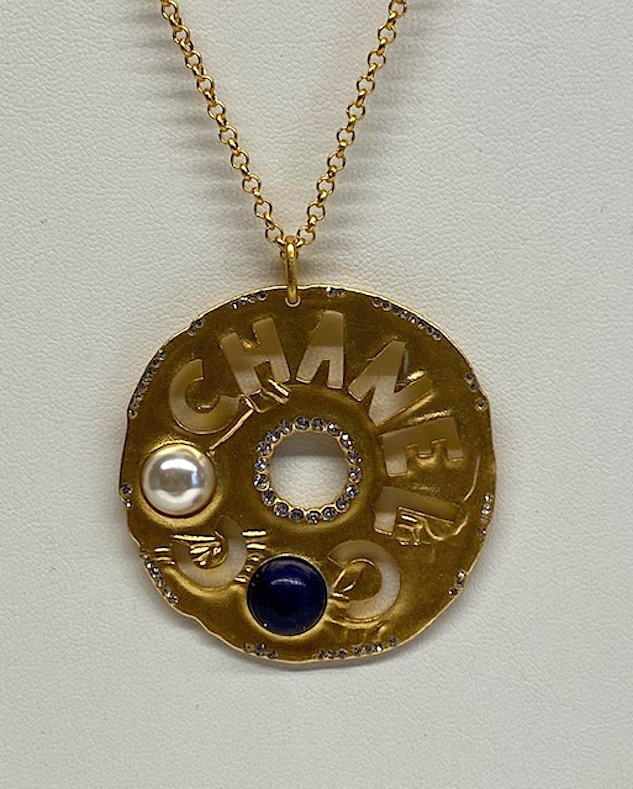 Chanel Cut Out Disk Pendant Necklace, 2019 Cruise Collection In Excellent Condition In New York, NY