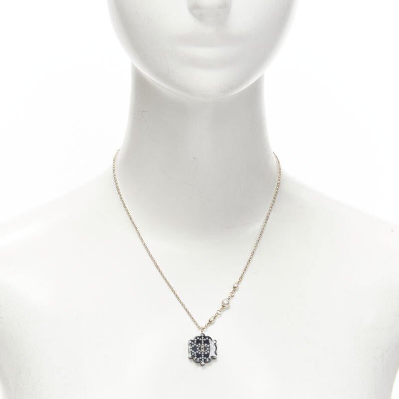 CHANEL D18 CC micro black snowflake acrylic triple pearl embellished necklace
Reference: TGAS/C01559
Brand: Chanel
Designer: Virginie Viard
Collection: D18
Material: Acrylic, Metal
Color: Black, Gold
Pattern: Logomania
Closure: Lobster Clasp
Extra