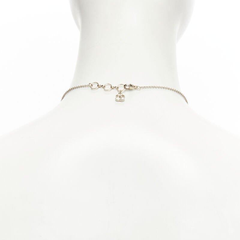 CHANEL D18 CC micro black snowflake acrylic triple pearl embellished necklace 2