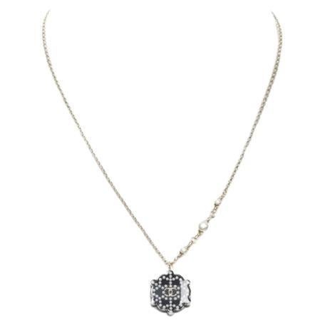 CHANEL D18 CC micro black snowflake acrylic triple pearl embellished necklace For Sale