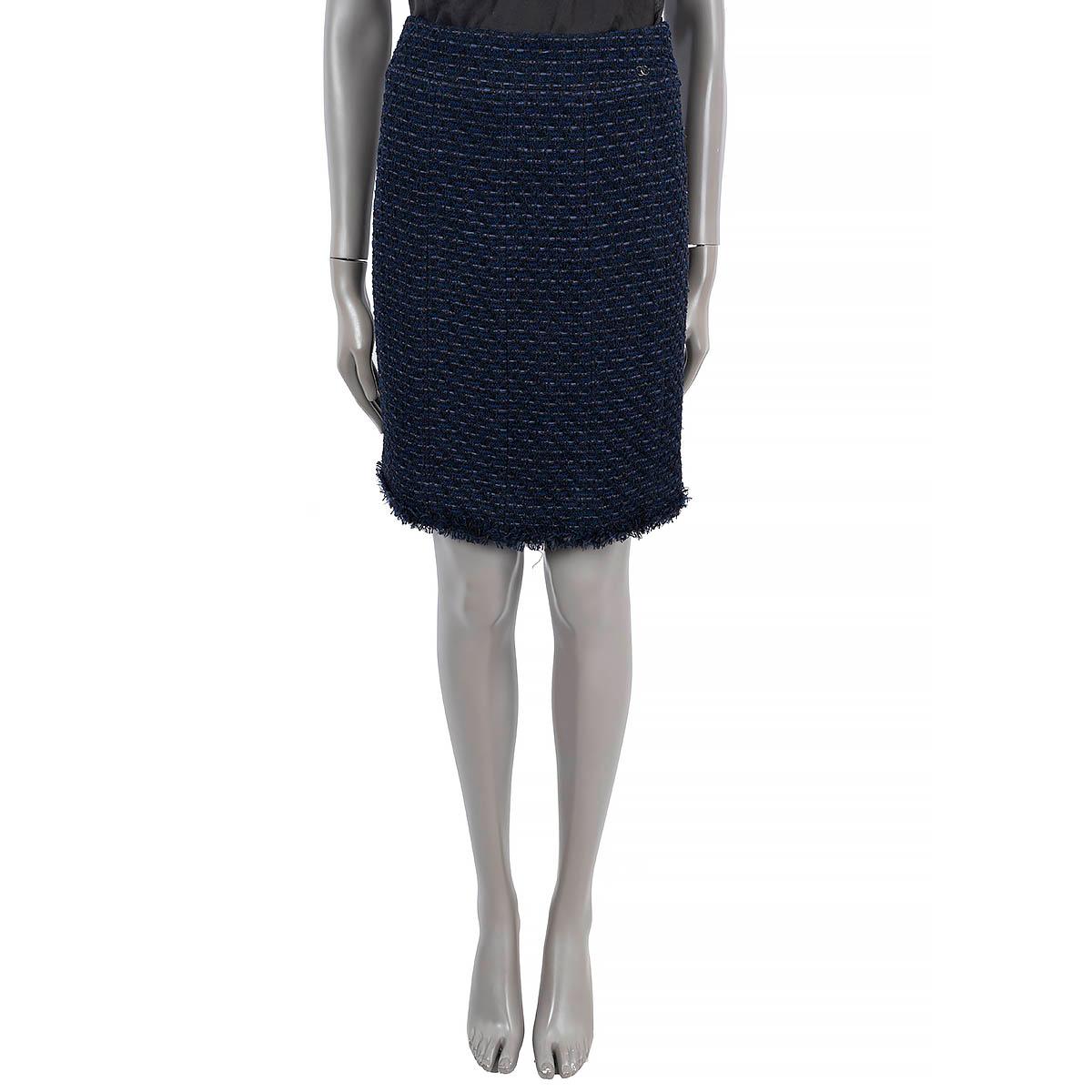 100% authentic Chanel lurex tweed skirt in midnight blue and black nylon (64%), rayon (17%), metal (7%), viscose (7%) and wool (5%). Features a fringed hem and a CC logo on the front. Opens with zipper and one hook on the back. Lined in midnight
