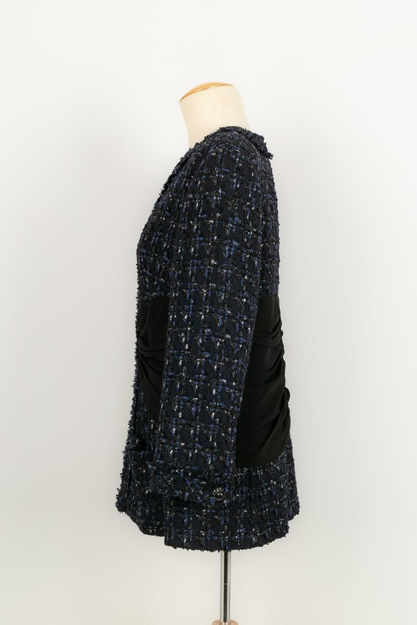 Chanel - (Made in France) Dark blue tweed jacket with silk lining. 
Size 46FR.

Additional information: 

Dimensions: 

Shoulder width: 
41 cm, Chest: 45 cm, Sleeve length: 52 cm, Length: 66 cm

Condition: 
Very good condition
Seller Ref number: FV7