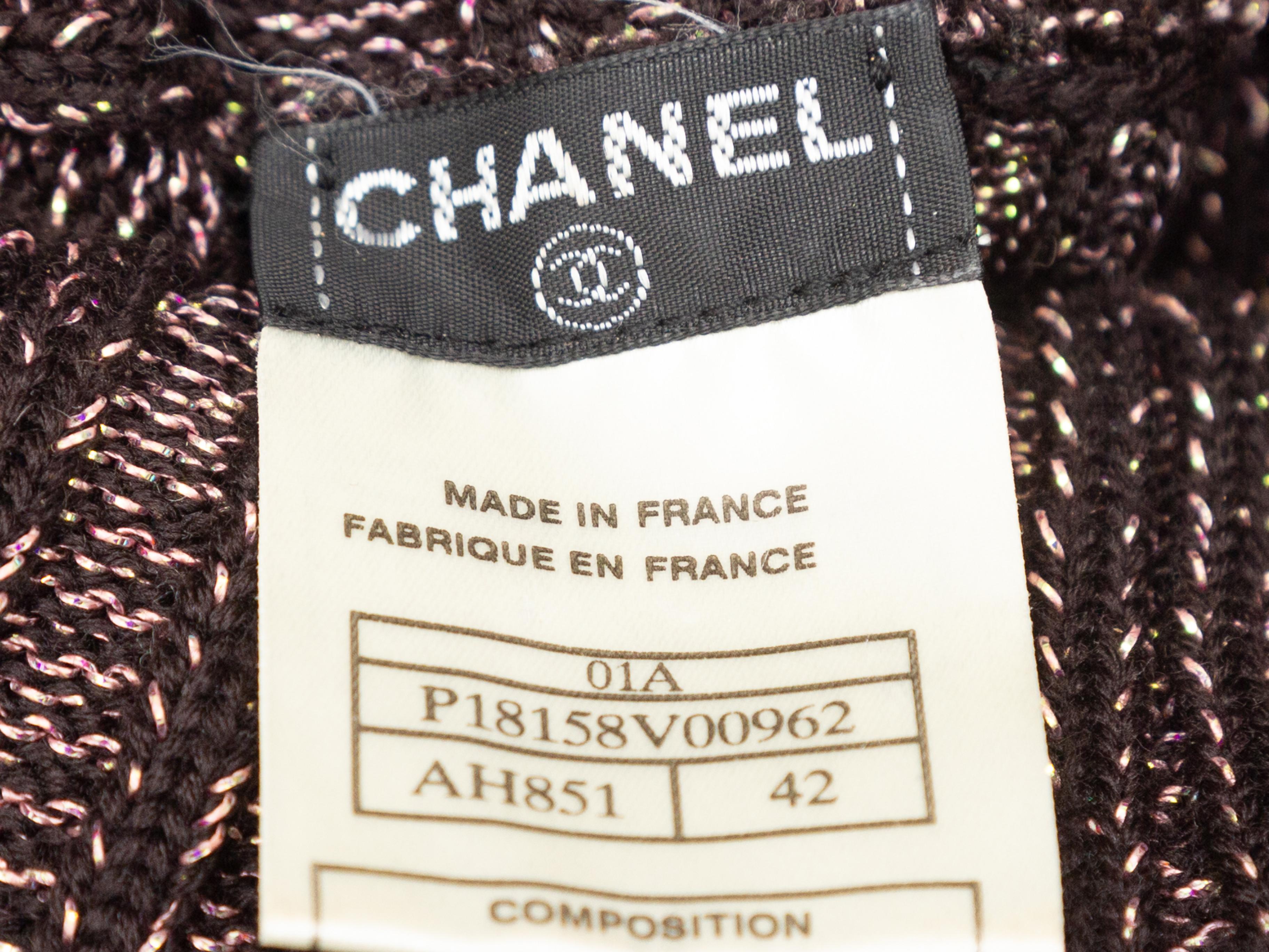 Product details: Dark brown metallic wool turtleneck sweater by Chanel. Circa 2001. Long sleeves. Designer size 42. 30