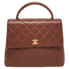 Chanel Dunkelbraune gesteppte Kelly Top Handle Tasche aus Leder Vintage
