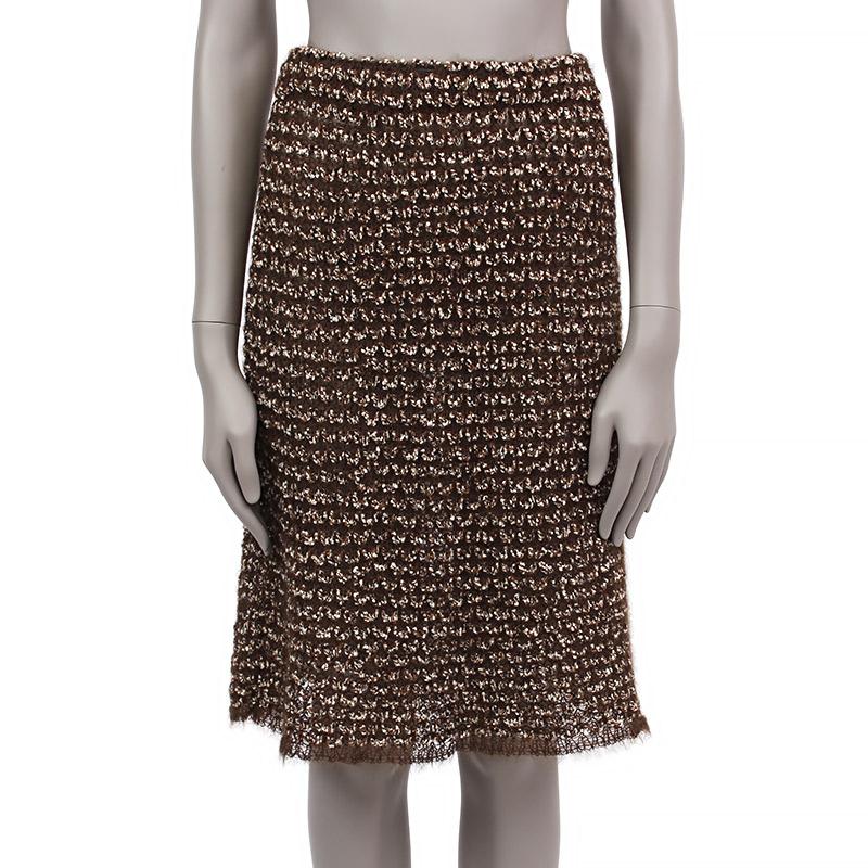 100% authentic Chanel flared knee-length skirt in chocolate brown, black and white wool (35%) mohair (35%), nylon (23%) and silk (7%). Unlined. Has been worn and is in excellent condition.

Tag Size	38
Size	S
Waist	66cm (25.7in) to 80cm