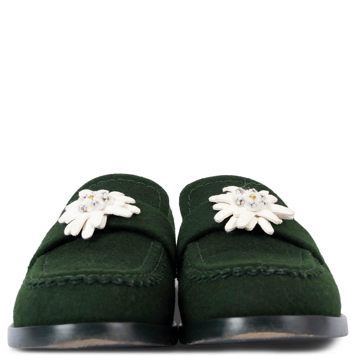 100% authentic Chanel Edelweiss penny loafers in forest green wool felt embellished with white lambskin Edelweiss flower. Have been worn and are in excellent condition. 

2015 Paris-Salzburg Metiers d'Art

Measurements
Model	15A G31006
Imprinted