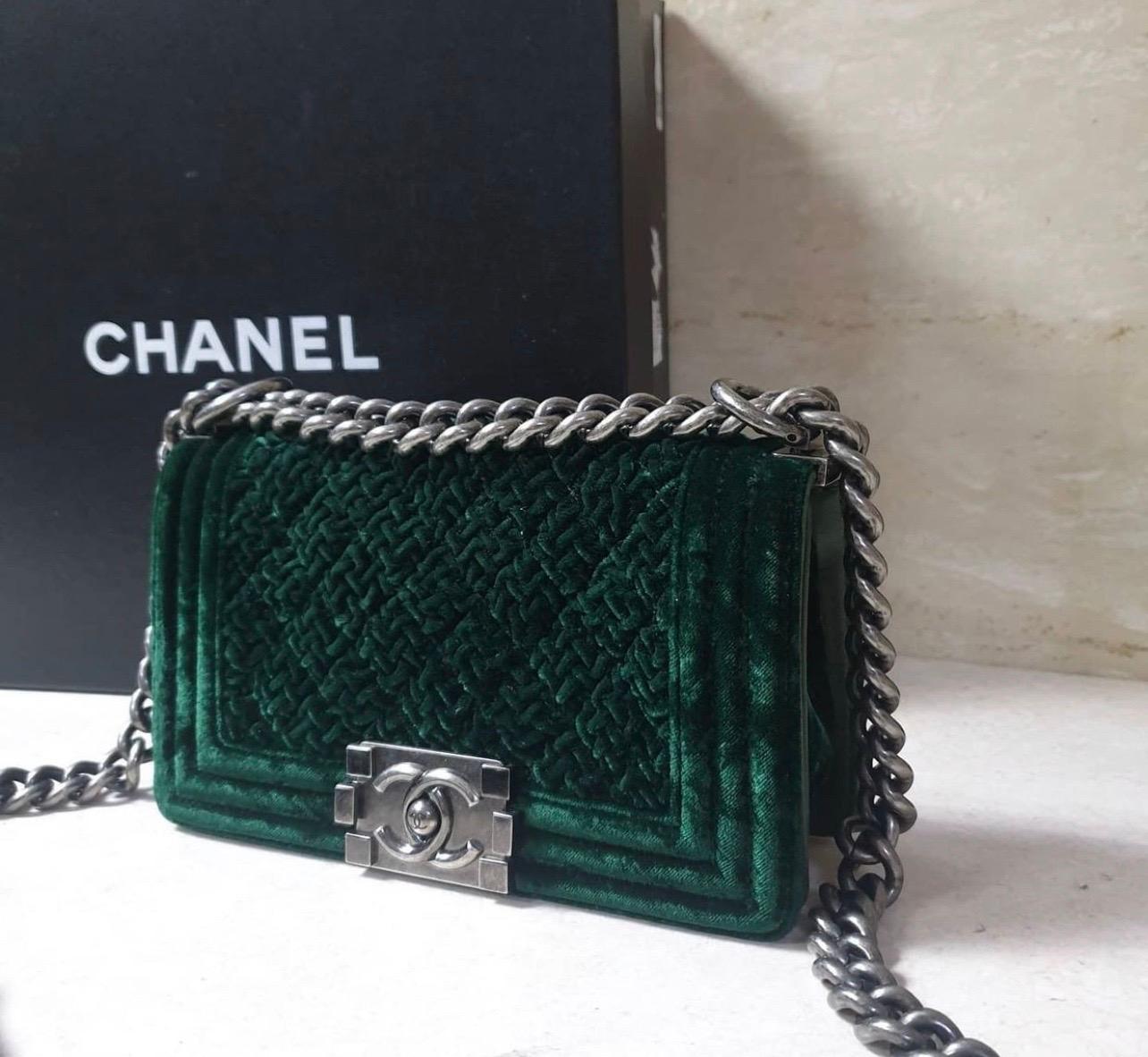 Chanel Dark Green Lambskin Leather & Velvet Mini Boy Bag with Antiqued Silver Hardware.

This bag is part of the Boy Chanel Collection, originally released in 2011. This is a new and fresh look for Chanel. The boy bag's shape in supposedly inspired