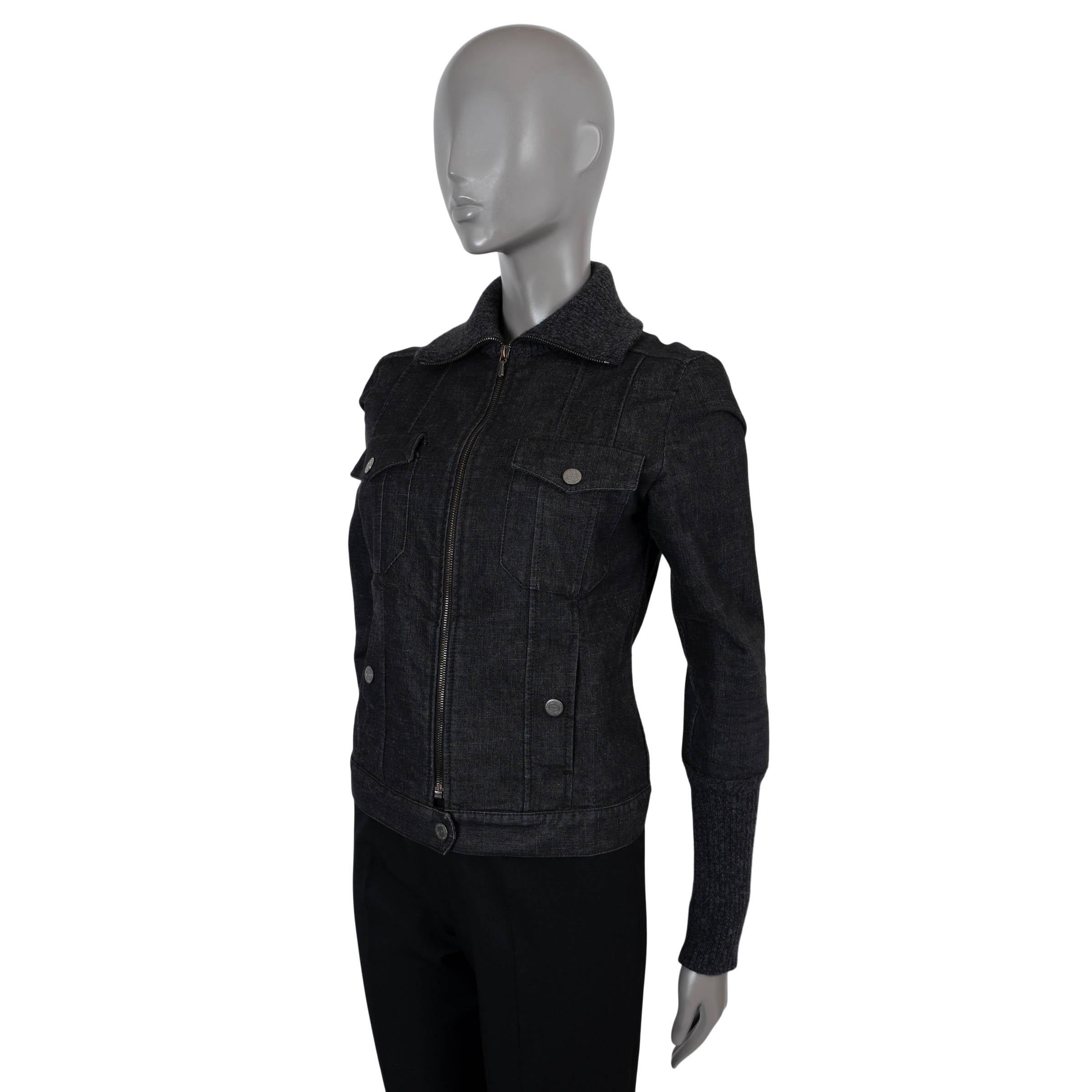100% authentic Chanel denim jacket in dark grey cotton (80%), polyester (18%) and elastane (2%). Features a high rib-knit collar and long cuffs in wool-angora blend, two buttoned flap pockets at the chest and two buttoned pockets at the waist.