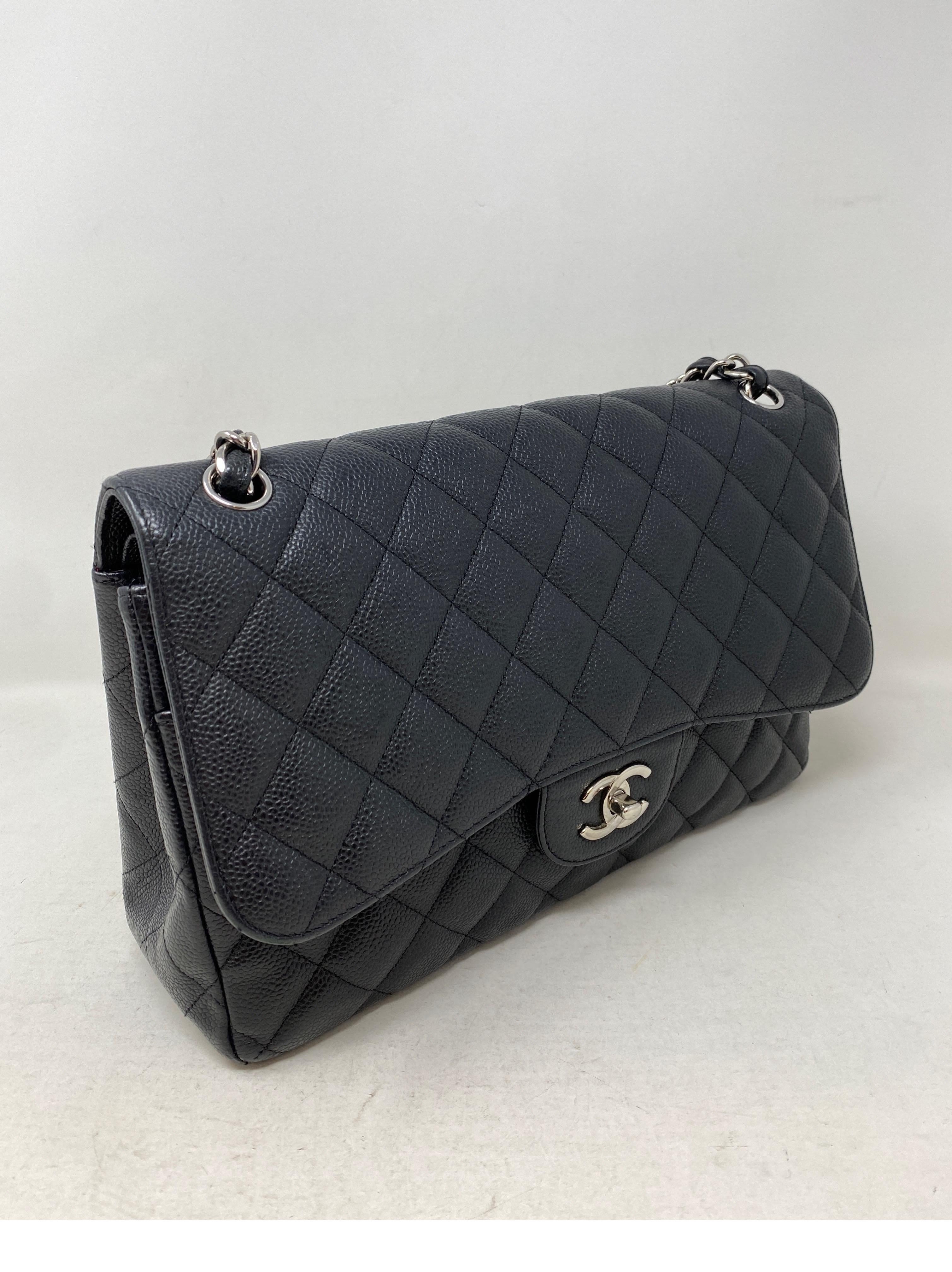 Chanel Dark Navy Jumbo Bag. Ruthenium hardware. Rare dark navy blue color. Double flap bag. Mint like new condition. Guaranteed authentic. 