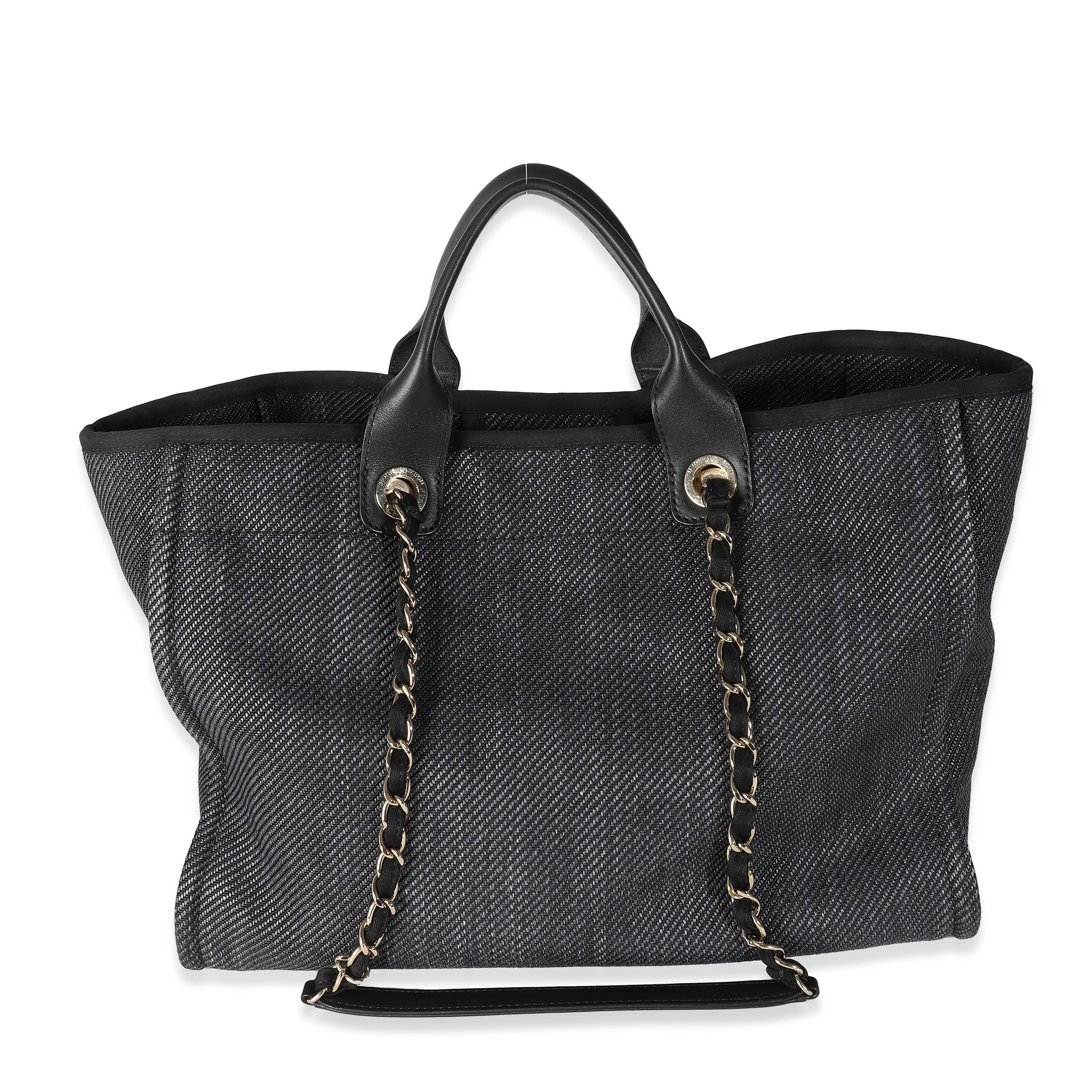 Listing Title: Chanel Dark Navy Mixed Fibers Large Deauville Tote
SKU: 141131
Condition: Pre-owned 
Handbag Condition: Very Good
Condition Comments: Item is in very good condition with minor signs of wear.  Light scratches along handles. Light